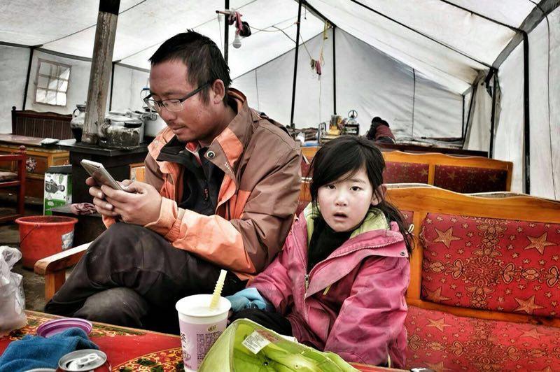 Vater und 4-j?hrige Tochter radeln durch China